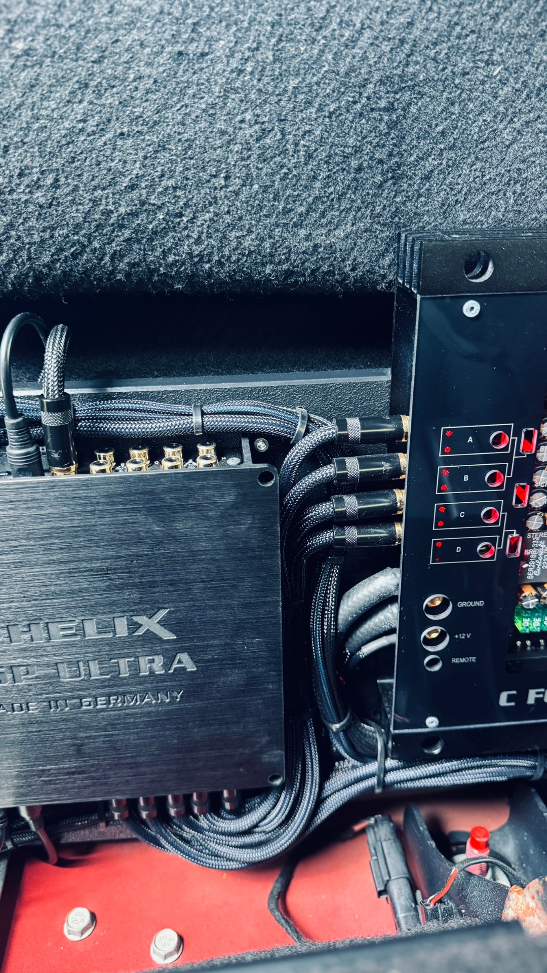 Helix DSP Ultra — braided RCAs pinned and dressed at the amp board.